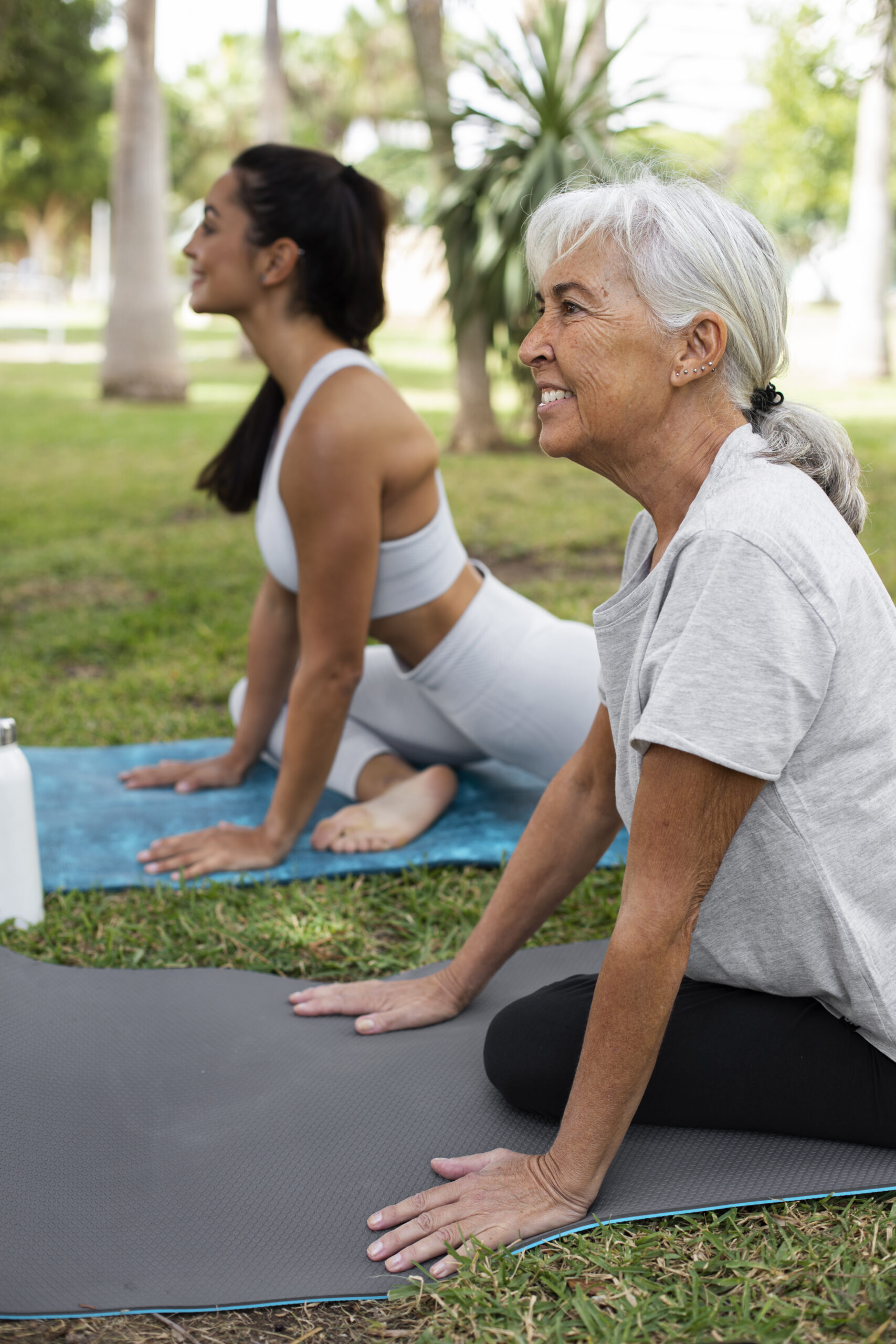 friends-doing-yoga-together-park