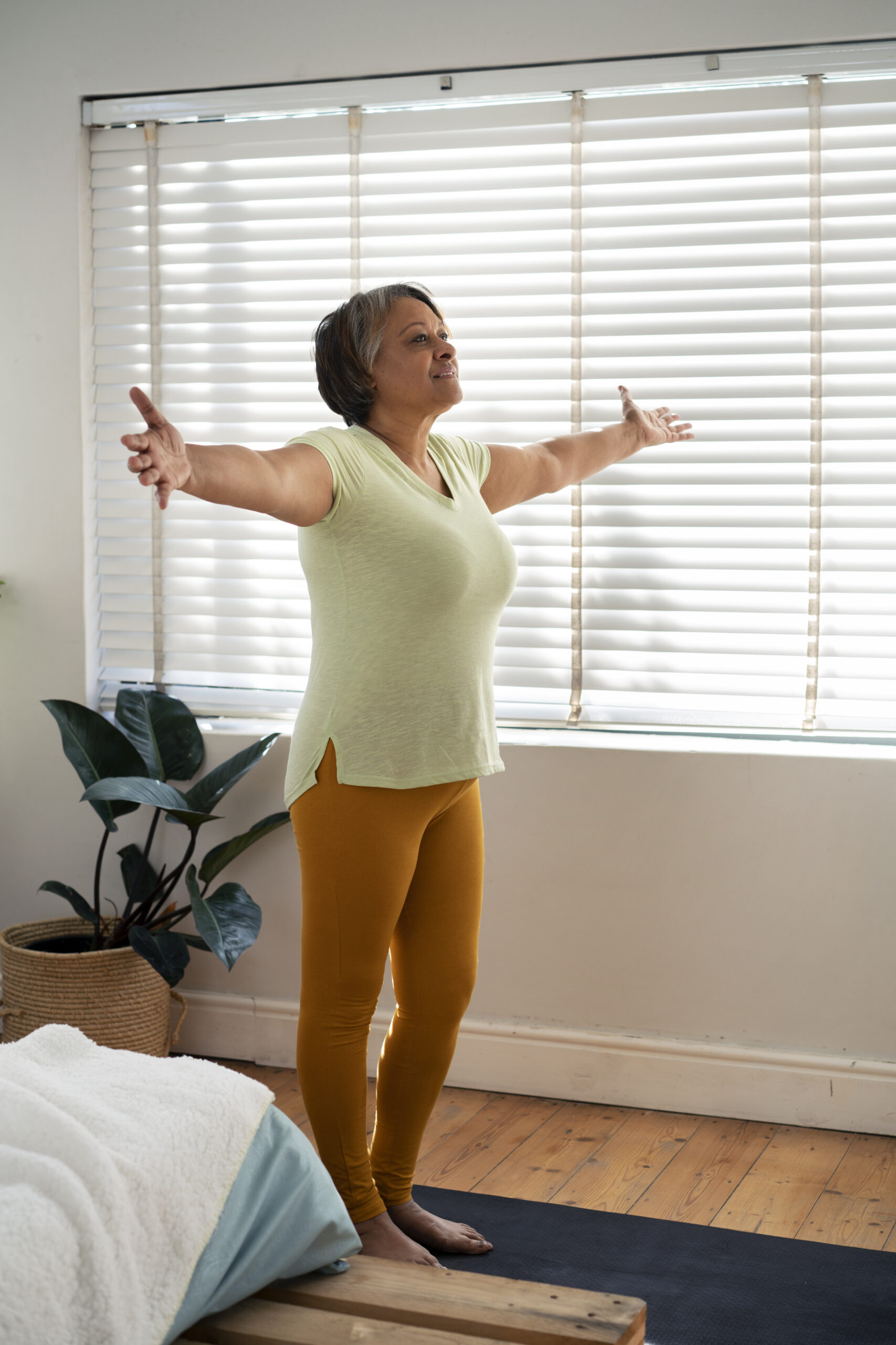 woman-exercising-yoga-mat-full-shot